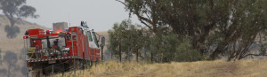 A photograph of a rural fire service truck at the aftermath of a bushfire on a dry Australian farm in central western NSW. The fire was started by a dry lighting strike on christmas day in 2014. It ws brought under control by us with the help of the rural fire service who, despite it being christmas day, were on site within 15 minutes of the fire starting. Unfortunately there are no photos of the actual fire because we were busy fighting it.