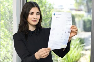 Woman reading her bill