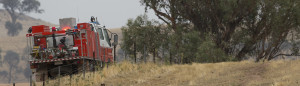 A photograph of a rural fire service truck at the aftermath of a bushfire on a dry Australian farm in central western NSW. The fire was started by a dry lighting strike on christmas day in 2014. It ws brought under control by us with the help of the rural fire service who, despite it being christmas day, were on site within 15 minutes of the fire starting. Unfortunately there are no photos of the actual fire because we were busy fighting it.