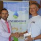 Westernport employee shaking hands with competition winner