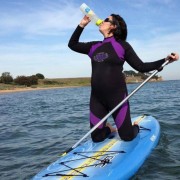 Lady drinking from Choose Tap bottle