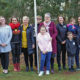 Photo of Aboriginal and Torres Strait Island women supported by Bass Coast community leaders following NAIDOC Week flag raising ceremony.