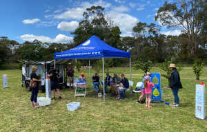 Community engagement stand at outdoor festival