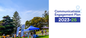 Community enjoying the sunshine at an event on the foreshore.